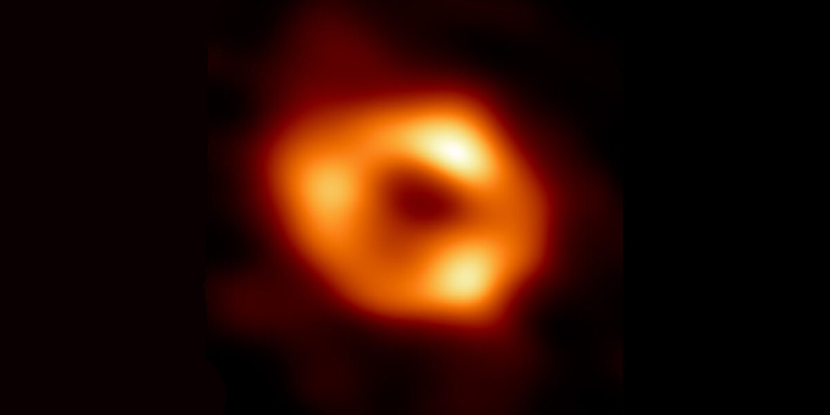 Sagittarius A*, the supermassive black hole at the center of the Milky Way galaxy that looks like a glowing orange ring