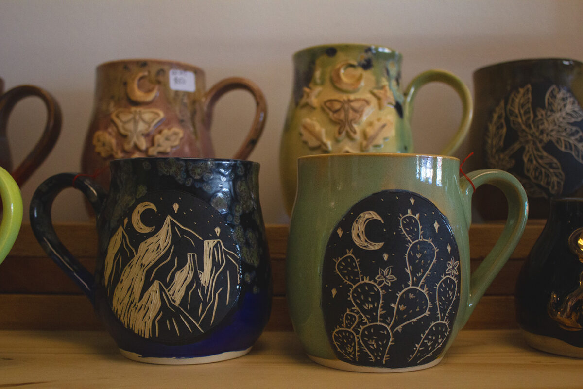 An assortment of unique ceramic mugs