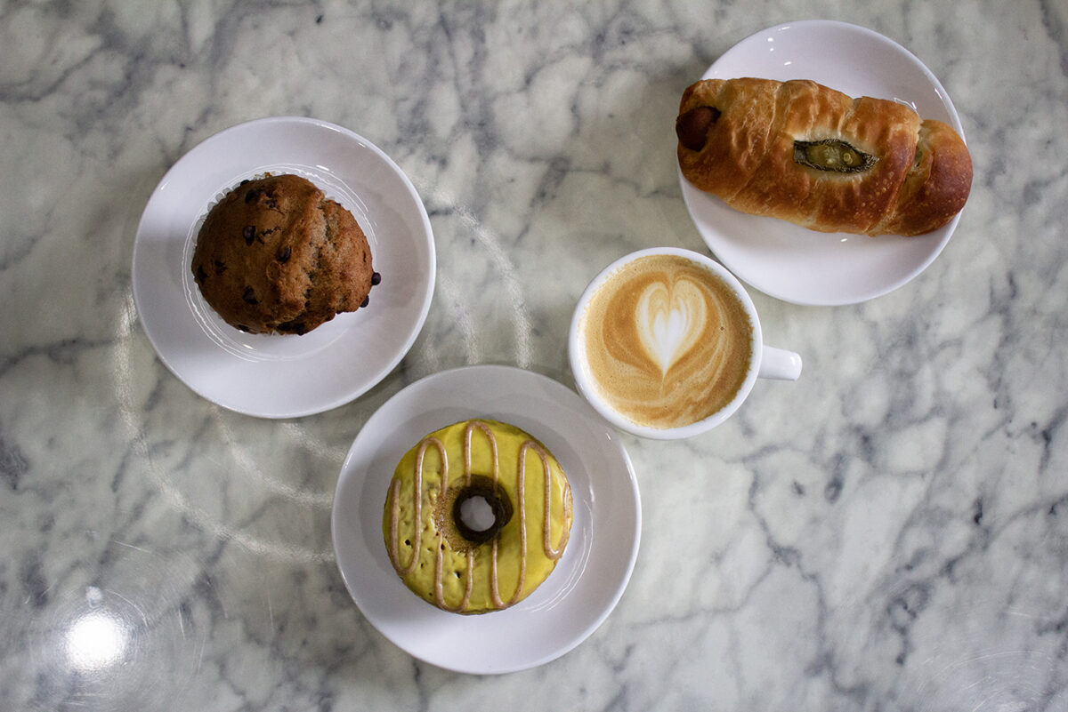 Various vegan pastries and a latte