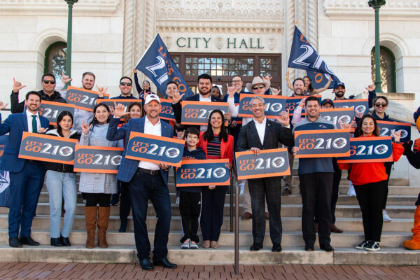 UTSA and city leaders pose for a photo