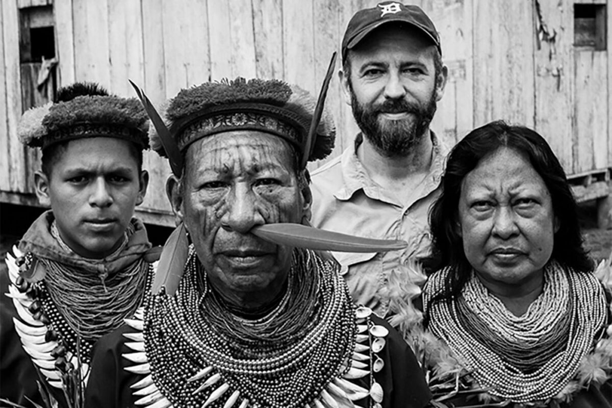 Michael Cepek with Cofán man, woman and teenage son