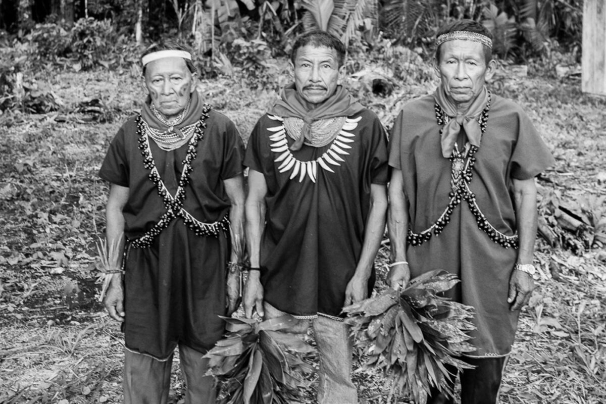 3 Cofán shamans in traditional attire