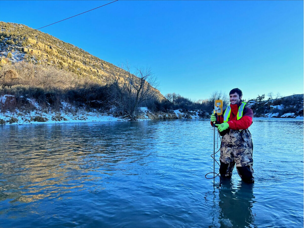 James Misutka stands in a body of water