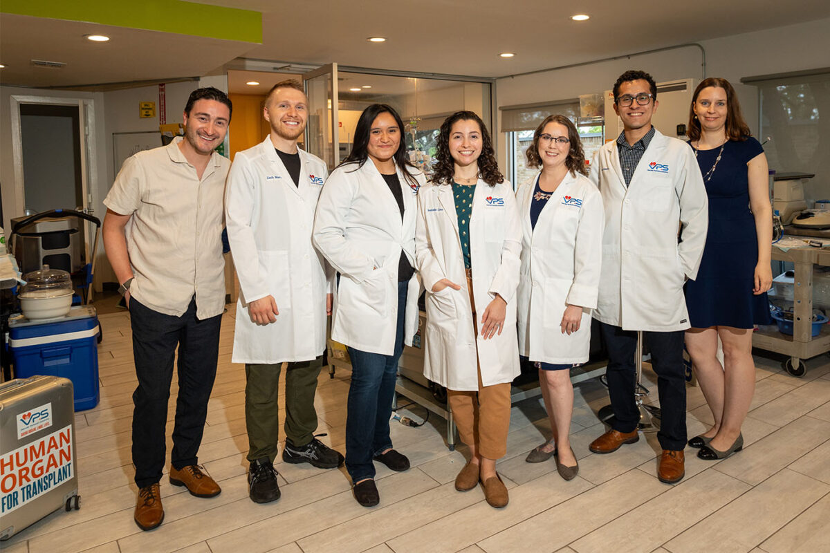 The team at Vascular Perfusion Solutions poses for a group photo in the laboratory.