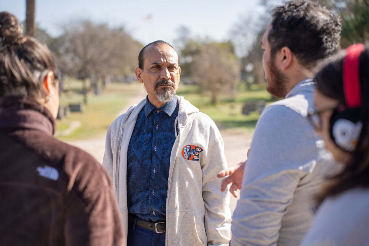 Jesse Borrego listens to students