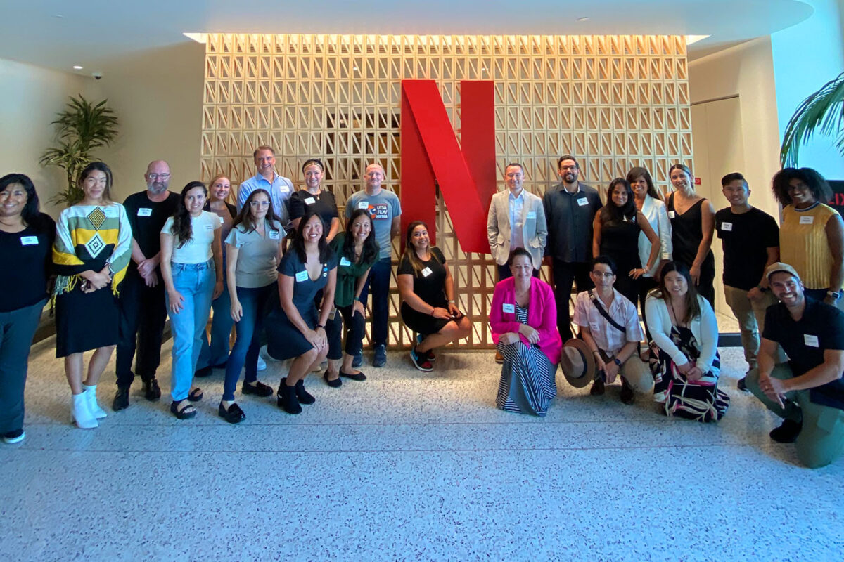 UTSA's delegation pose for a photo in the lobby of Netflix’s L.A. headquarters