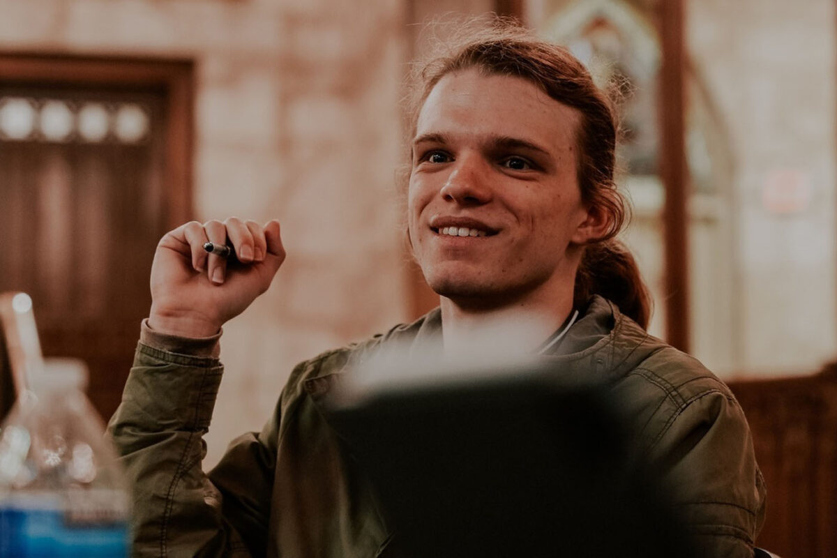 Wyatt Frantz holds a pen at the UTSA Southwest Campus