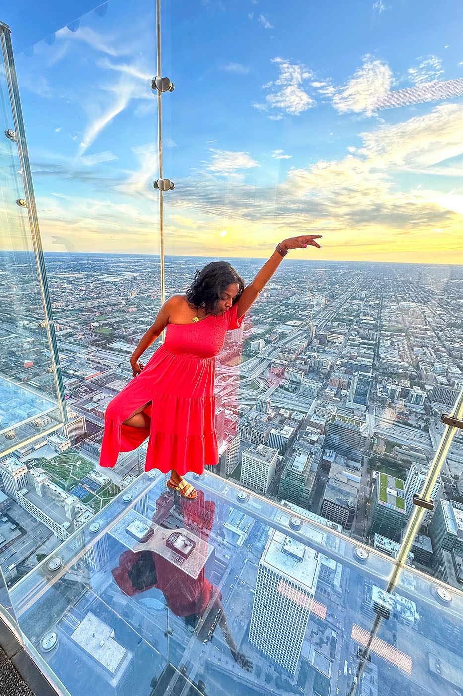 Thiruvengadam does a ballet pose in a skybox