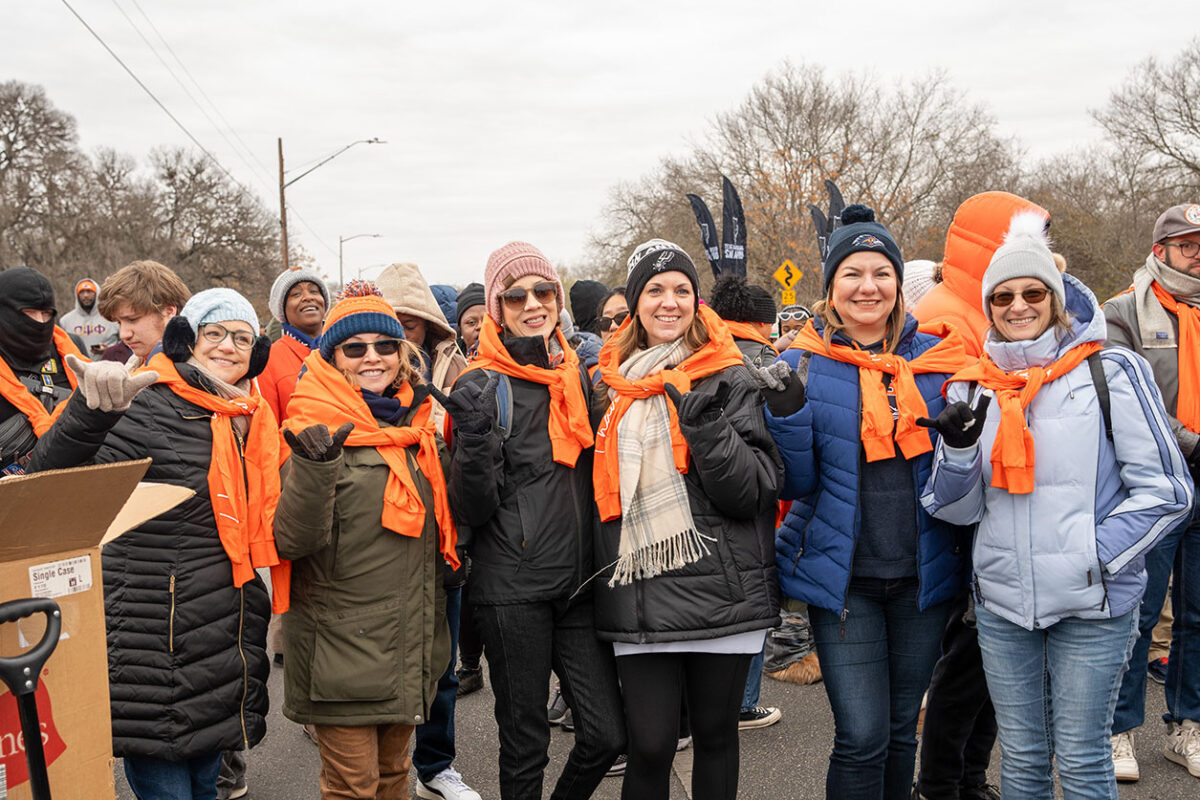 Six woman stand together