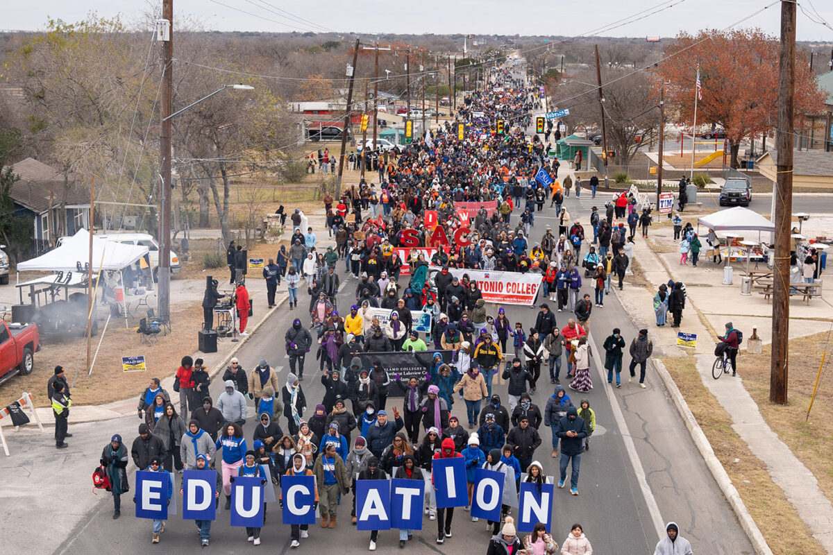 Thousands of people walk together