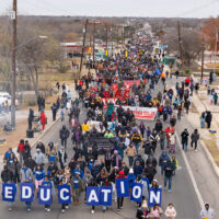 Thousands of people walk together