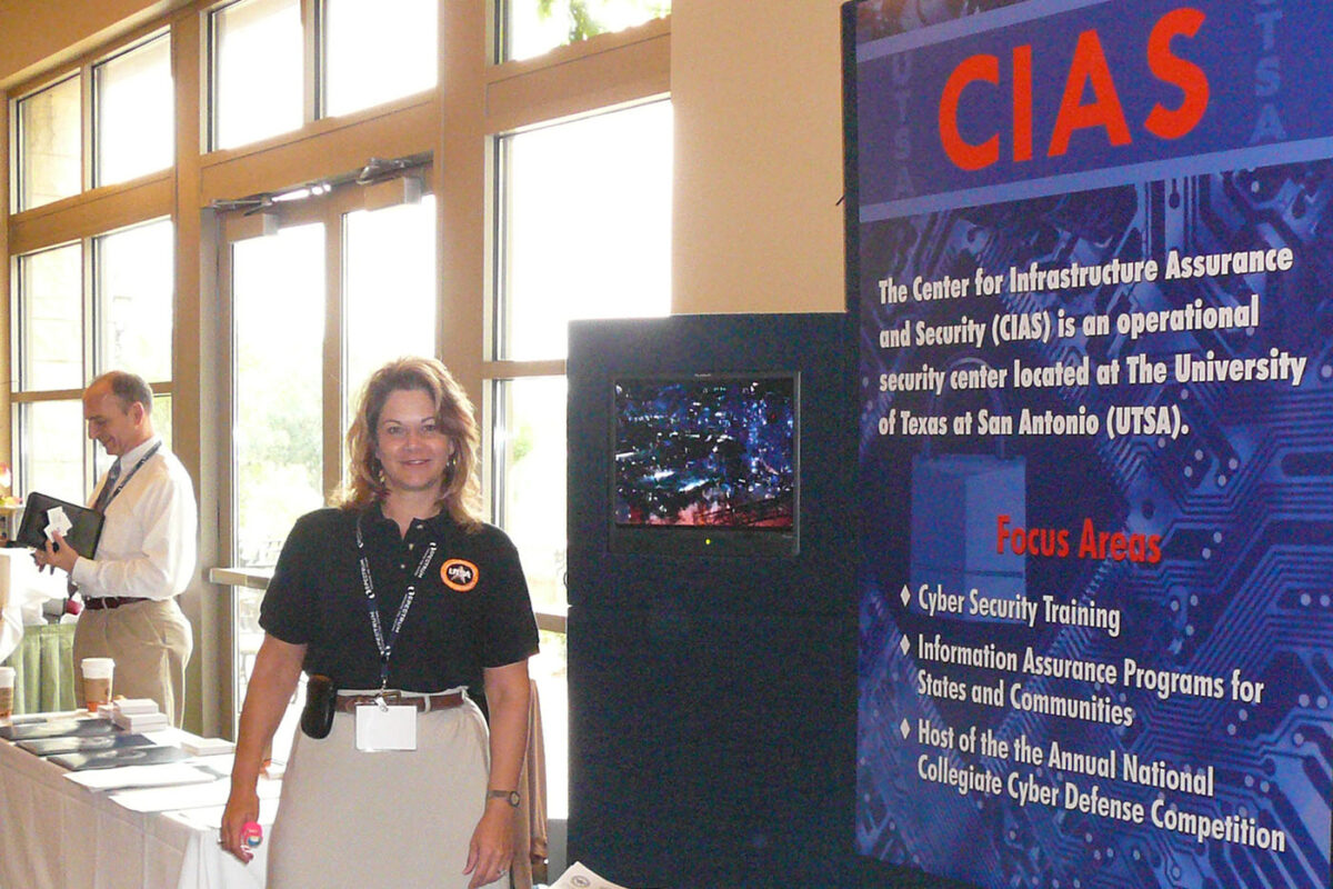 Natalie Sjelin standing by a large CIAS display