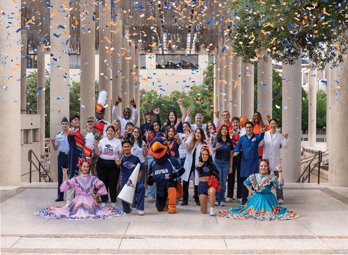 A group of individuals dressed in various attires representing being a part of different communities such as cheerleading, marching band and research.