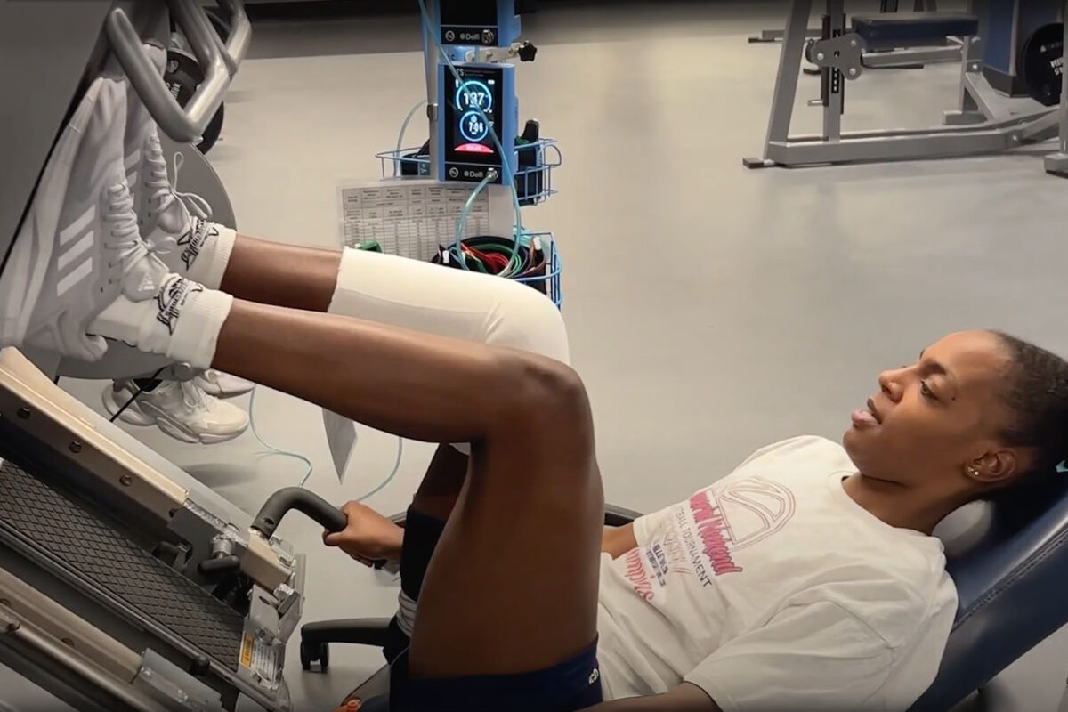 Jenkins uses a machine to do leg lifts