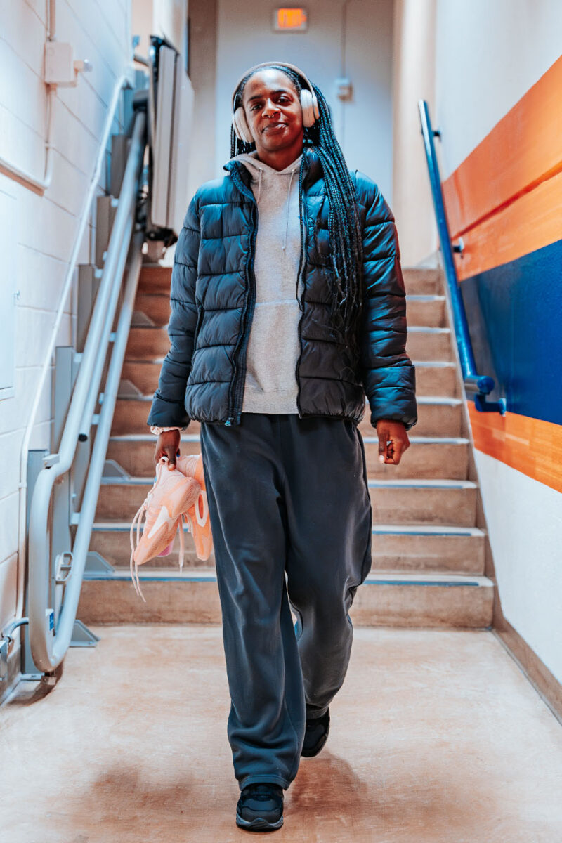 Jordyn Jenkins walks through a Convocation Center hallway
