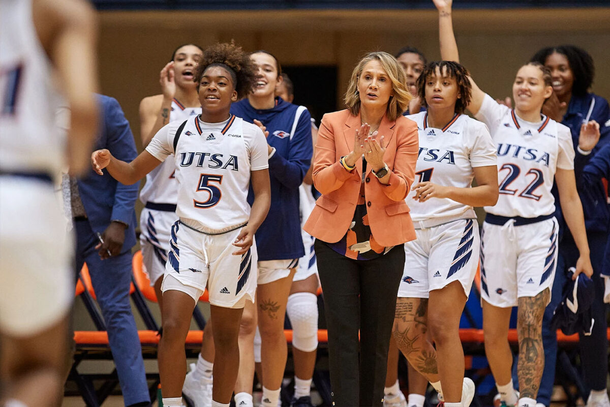 Aston and the UTSA bench celebrate a big play.