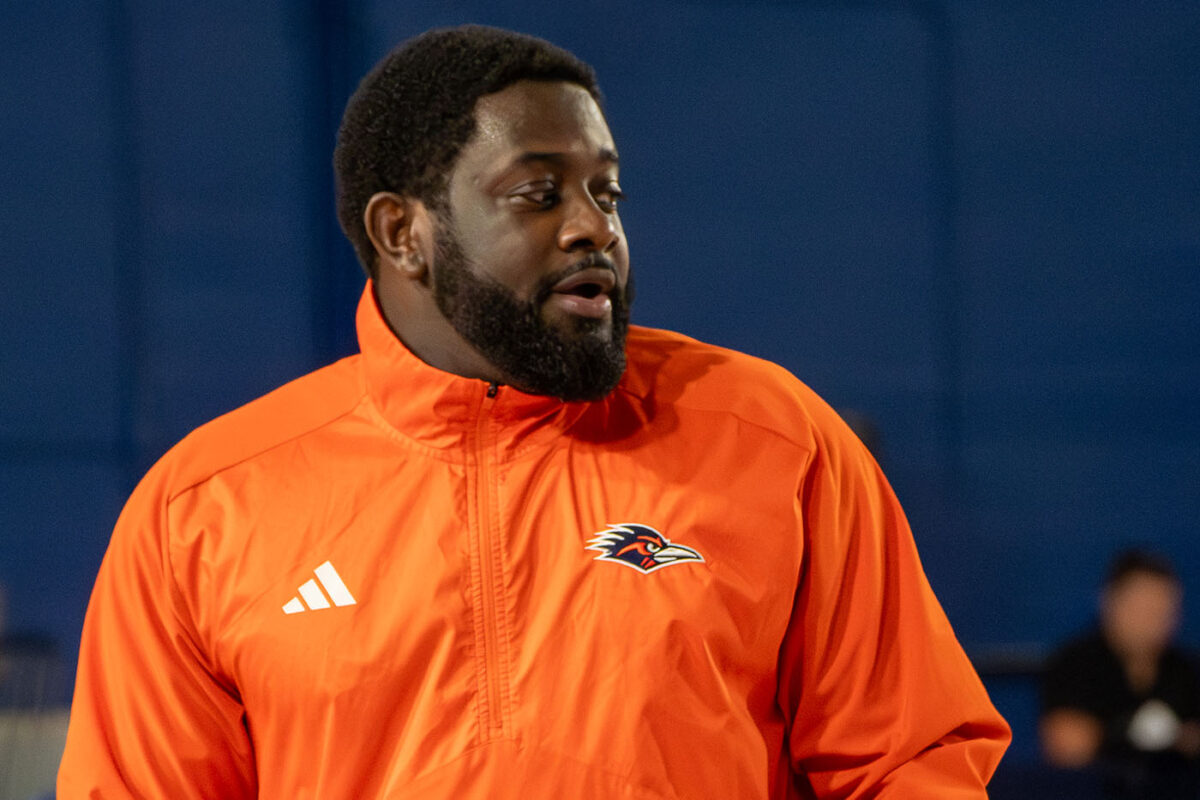 Assistant coach Cameron Miles at a pre-game warm-up