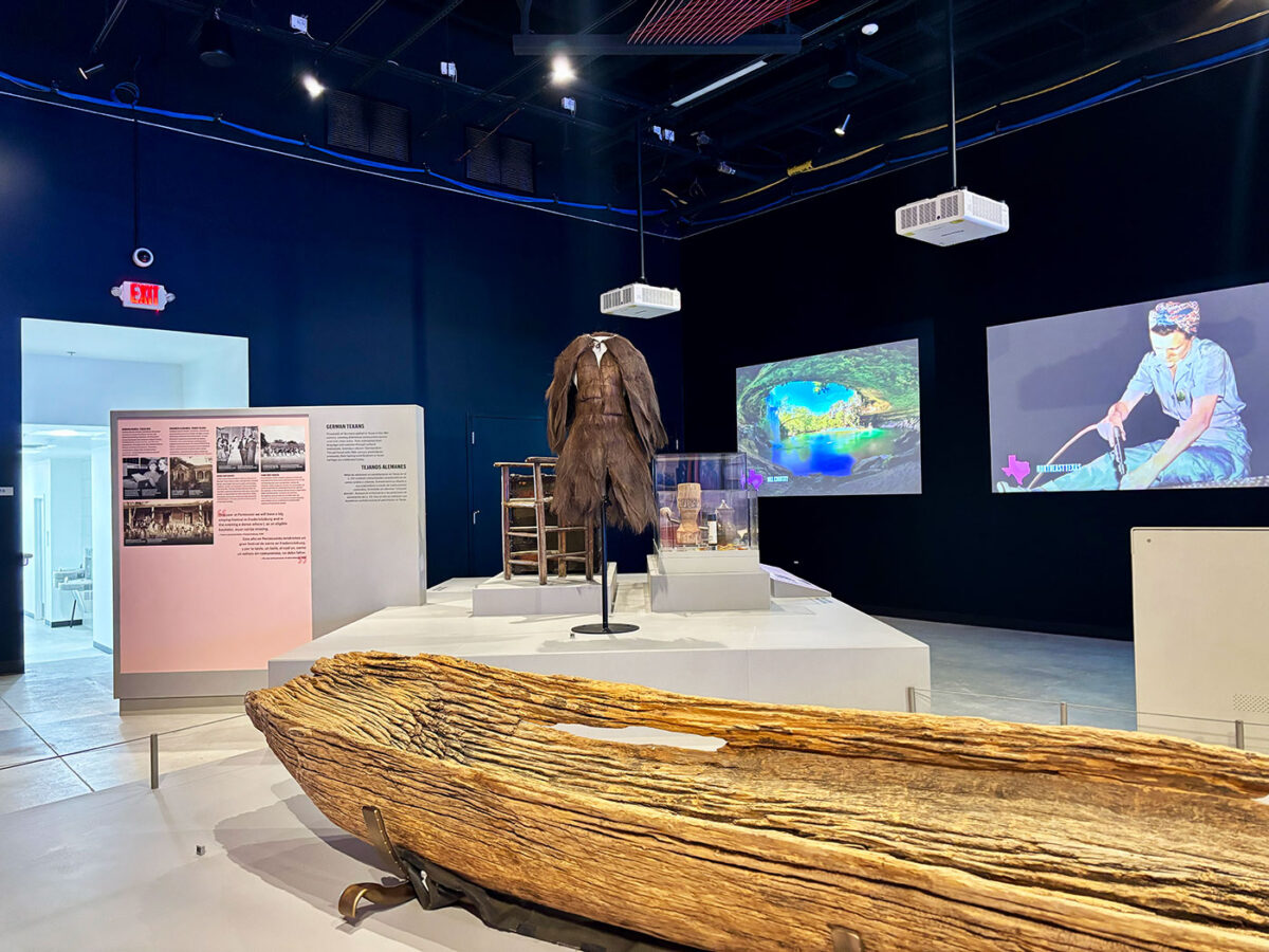 An exhibit at the Institute of Texan Cultures, which has a dugout canoe on display.