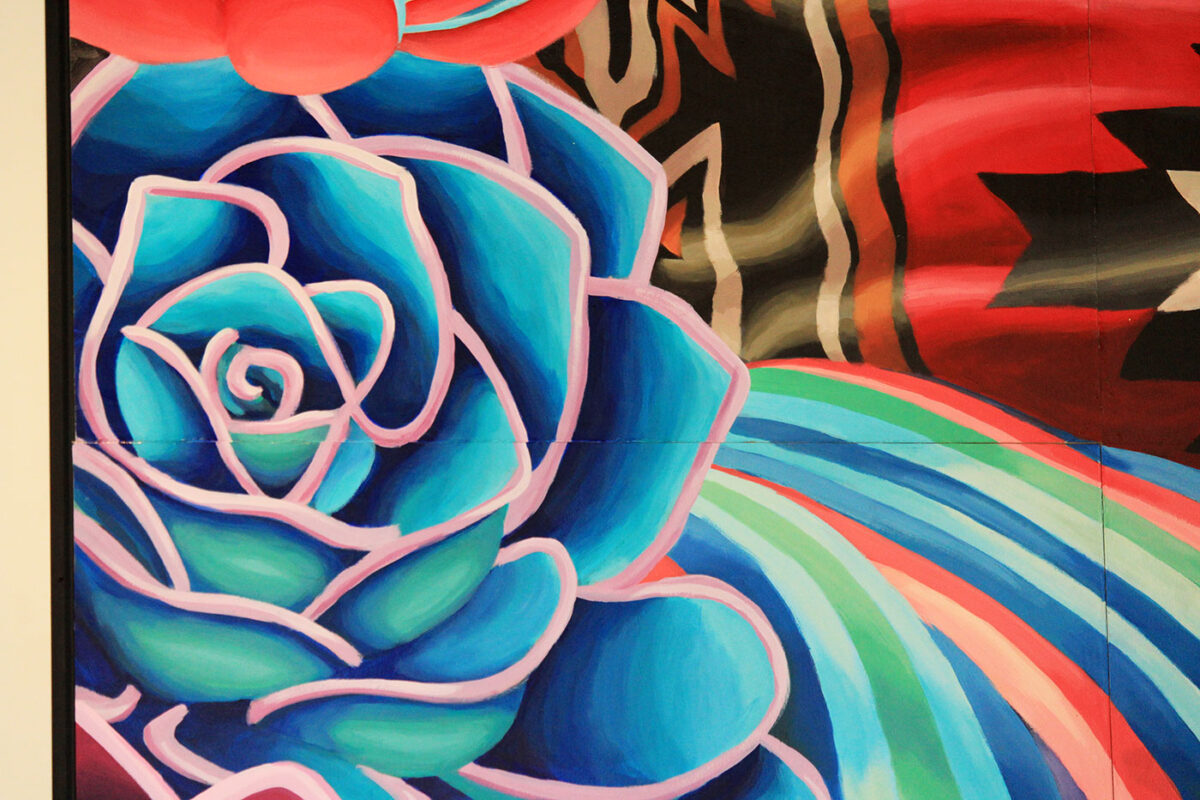 A painting of a succulent, which is part of a mural at the Institute of Texan Cultures.